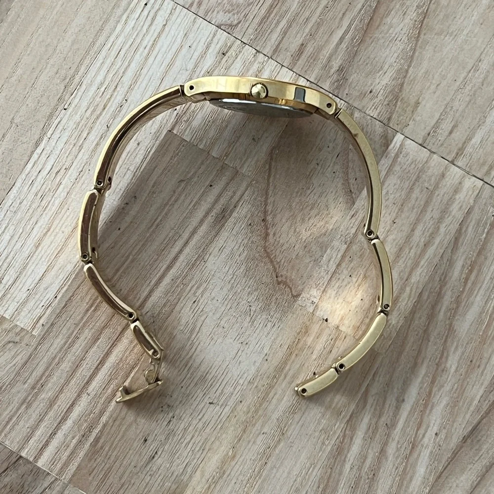 ESQ by Movado Ladies Watch Black Dial Gold Tone Bracelet and Hands